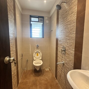 Bathroom in 2 BHK Apartment at Shreenathji Delta Heights, Ulwe Sector 5 – for Rent