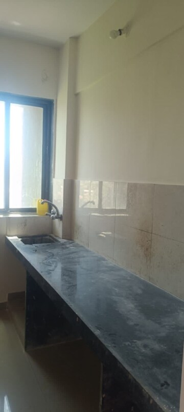 Kitchen in 1 BHK Apartment at Vantage Green Woods, Shilphata – for Rent