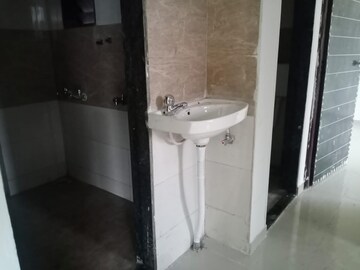 Bathroom in 1 BHK Apartment at Vantage Green Woods, Shilphata – for Sale