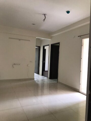 Living Room in 2.5 BHK Apartment at Apex Golf Avenue Sports City, Sector 1 Greater Noida – for Sale