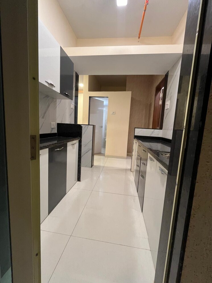 Kitchen, mohan-precious-greens 2 Bedroom 930 Sq.Ft. Apartment In Ambernath Thane 8873269