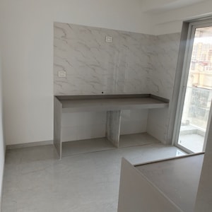 Kitchen in 3 BHK Apartment at Shreenathji Celestial Heights, Vijaykar Wadi – for Sale