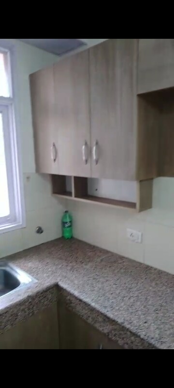 Kitchen in 2.5 BHK Apartment at SRS Royal Hills, Sector 87 – for Rent