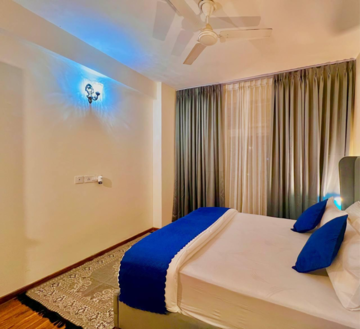 Bedroom in 3 BHK Apartment at Omaxe The Palace, Sushant Golf City – for Rent