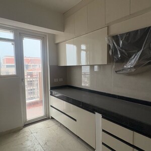 Kitchen in 4 BHK Apartment at Rishita Manhattan, Sarsawan – for Rent