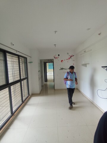 Living Room in 2 BHK Apartment at Lodha Palava Downtown, Dombivli East – for Rent
