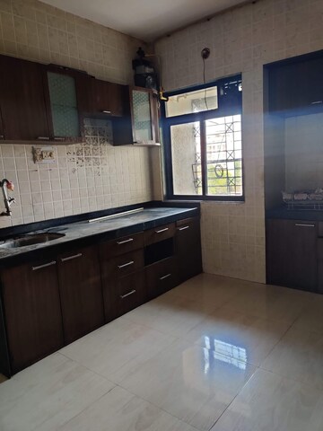 Kitchen in 1 BHK Apartment at New Anand Park CHS, Wagle Industrial Estate – for Rent