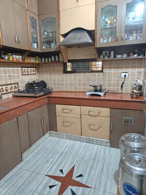 Kitchen in 4 BHK Independent House at Laxman Vihar – for Sale