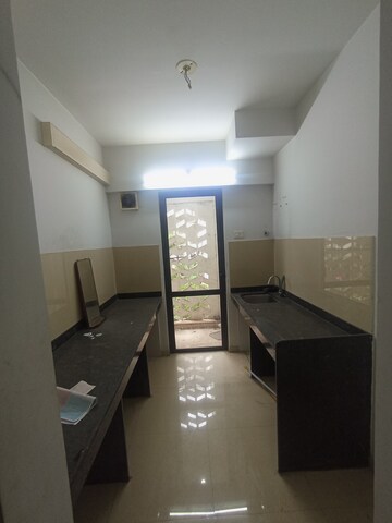 Kitchen in 1.5 BHK Apartment at Lodha Palava City Lakeshore Greens, Dombivli East – for Rent