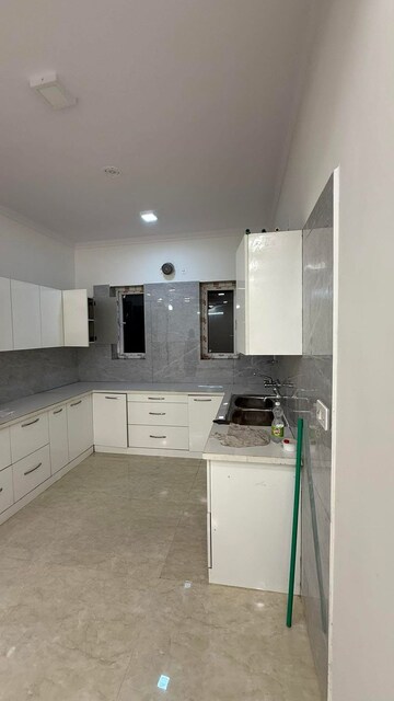 Kitchen in 3 BHK Builder Floor at Green Fields Colony – for Sale