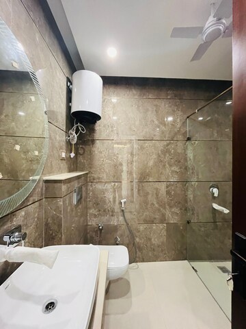 Bathroom in 4 BHK Builder Floor at Green Fields Colony – for Sale