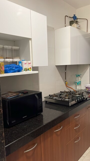 Kitchen in 1 BHK Apartment at Rizvi Cedar, Malad East – for Rent