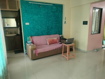 Living Room in 2 BHK Apartment at Nirman Abhilasha, Lohgaon – for Rent