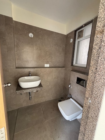 Bathroom in 1 BHK Apartment at Godrej Nest Kandivali, Kandivali East – for Rent