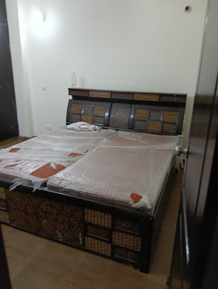 Bedroom, wave-dream-homes 2 Bedroom 808 Sq.Ft. Apartment In Wave City Ghaziabad 8874315