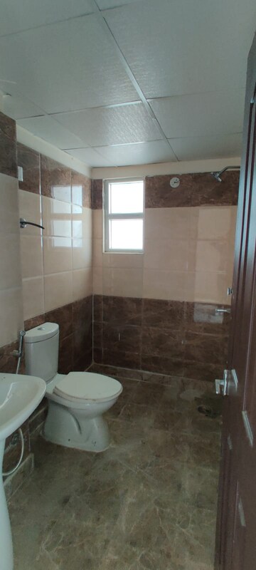 Bathroom in 1 BHK Apartment at Eureka Diya Green City, Raj Nagar Extension – for Sale
