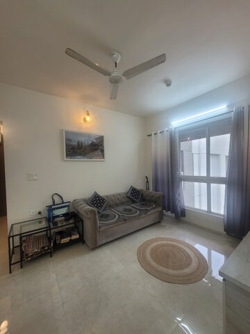 Living Room in 2 BHK Apartment at Lodha Amara, Kolshet Road – for Rent