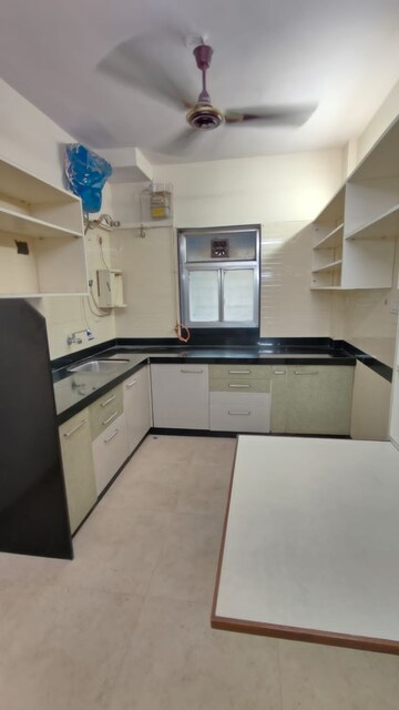 Kitchen in 1 BHK Apartment at Malad CHS, Malad East – for Sale