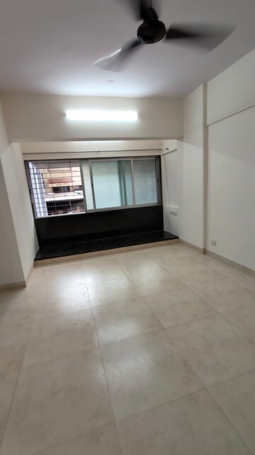 Room in 1 BHK Apartment at Malad CHS, Malad East – for Sale