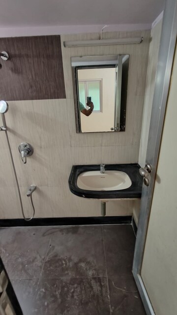 Bathroom in 1 BHK Apartment at Malad CHS, Malad East – for Sale