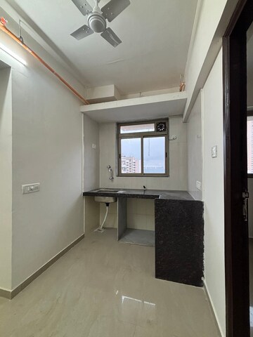 Kitchen in 1 BHK Apartment at Satellite Garden, Goregaon East – for Rent