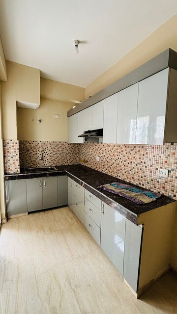 Kitchen in 3 BHK Apartment at Advitya Homes, Sector 143 – for Rent