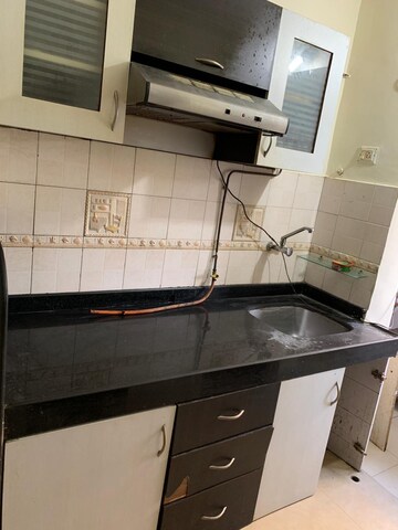 Kitchen in 2 BHK Apartment at RNA NG Suncity Phase III, Kandivali East – for Sale