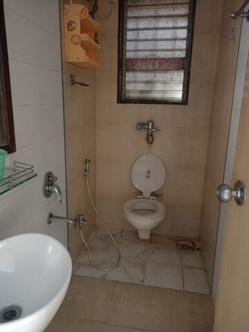 Bathroom in 2 BHK Apartment at Dosti Group Acres, Wadala East – for Rent