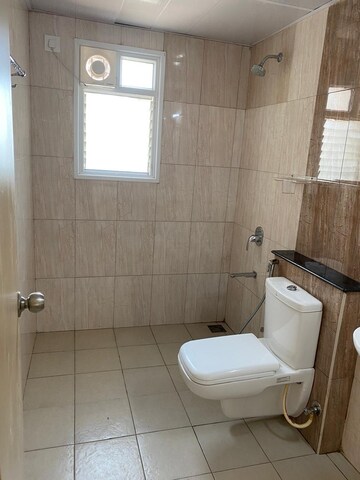 Bathroom in 2.5 BHK Apartment at Mantri Webcity, Hennur – for Rent