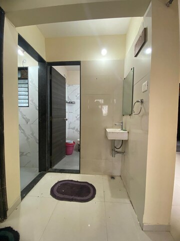 Bathroom in 1 BHK Apartment at Dosti Desire, Brahmand – for Sale
