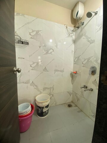 Bathroom in 1 BHK Apartment at Dosti Desire, Brahmand – for Sale