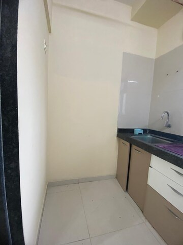 Kitchen in 1 BHK Apartment at Dosti Desire, Brahmand – for Sale