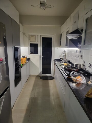 Kitchen in 4 BHK Apartment at Exotica Fresco, Sector 137 – for Sale