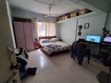 Bedroom in 2 BHK Apartment at Damodar Prasad Apartments, Hingne Khurd – for Rent