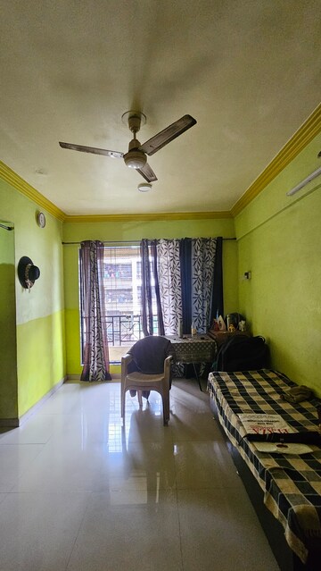 Master Bedroom in 1 BHK Apartment at Rajguru CHS, Dombivli West – for Sale
