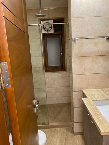 Bathroom in 3 BHK Apartment at Boutique Residential Apartments A-10, Gulmohar Park – for Rent
