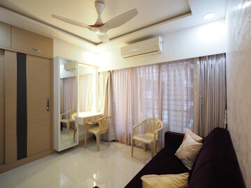 Living Room in 2 BHK Apartment at Acme Ozone, Manpada – for Rent