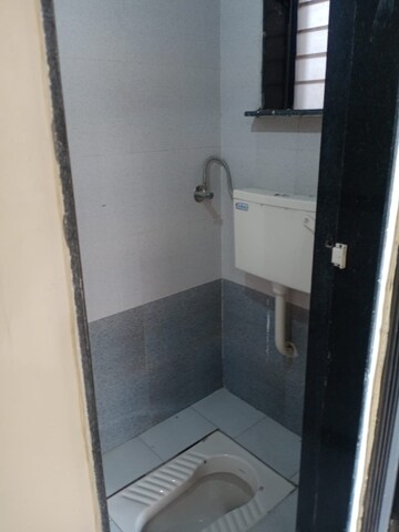 Bathroom in 1 BHK Apartment at Sheetal Dhara Complex, Kamothe – for Rent