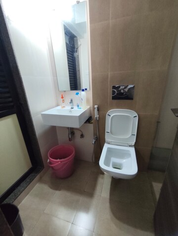 Bathroom in 1 BHK Apartment at Kanakia Rainforest, Andheri East – for Rent