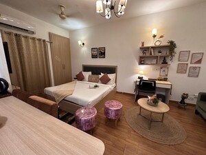 Living Room in Studio Apartment at Nimbus The Golden Palm, Sector 168 – for Sale