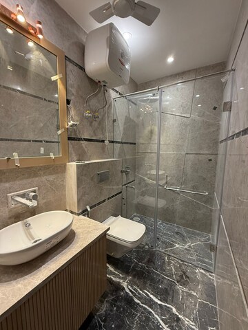 Bathroom in 3 BHK Builder Floor at DLF Atria, Dlf Phase ii – for Sale