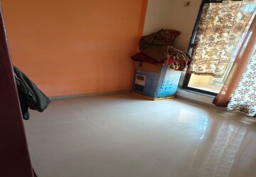 Living Room in 1 BHK Apartment at Squarefeet Orchid Square, Ambernath West – for Sale