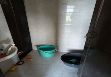 Bathroom in 1 BHK Apartment at Squarefeet Orchid Square, Ambernath West – for Sale