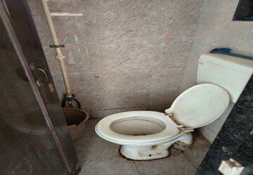 Bathroom in 1 BHK Apartment at Squarefeet Orchid Square, Ambernath West – for Sale