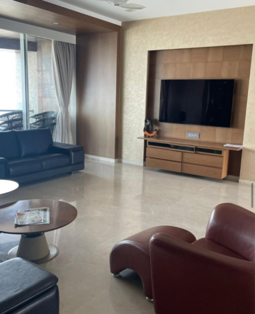 Living Room in 2 BHK Apartment at Transcon Triumph Tower, Veera Desai Industrial Estate – for Sale