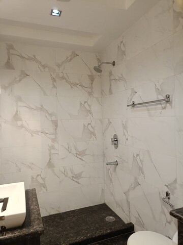 Bathroom in 4 BHK Builder Floor at Kailash Colony – for Rent