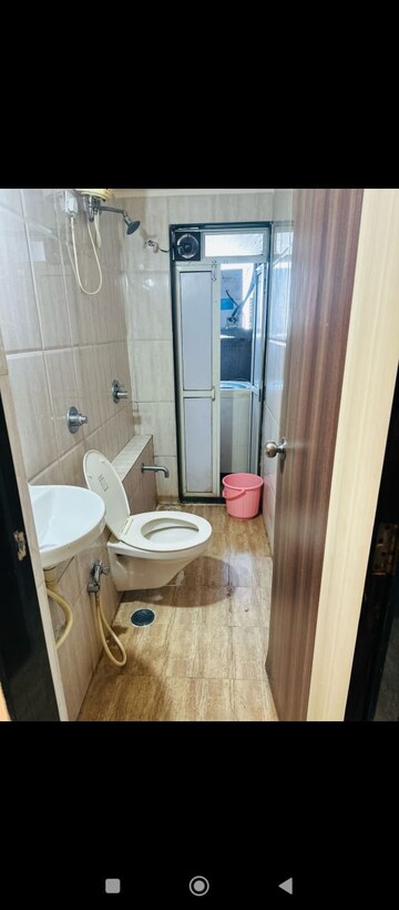 Bathroom in 1 BHK Apartment at Satellite Garden, Goregaon East – for Rent