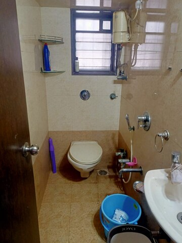 Bathroom in 3 BHK Apartment at Goyal Lakshchandi Heights, Goregaon East – for Rent