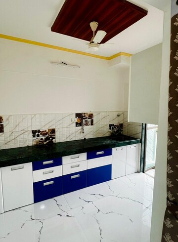 Kitchen in 1 BHK Apartment at Man Opus, Mira Road – for Sale