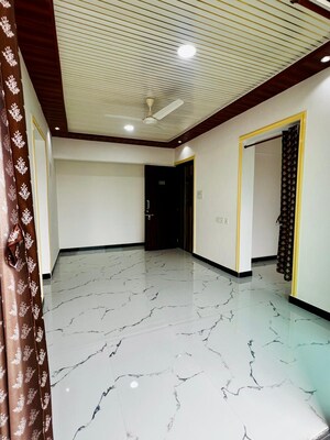 Living Room in 1 BHK Apartment at Man Opus, Mira Road – for Sale